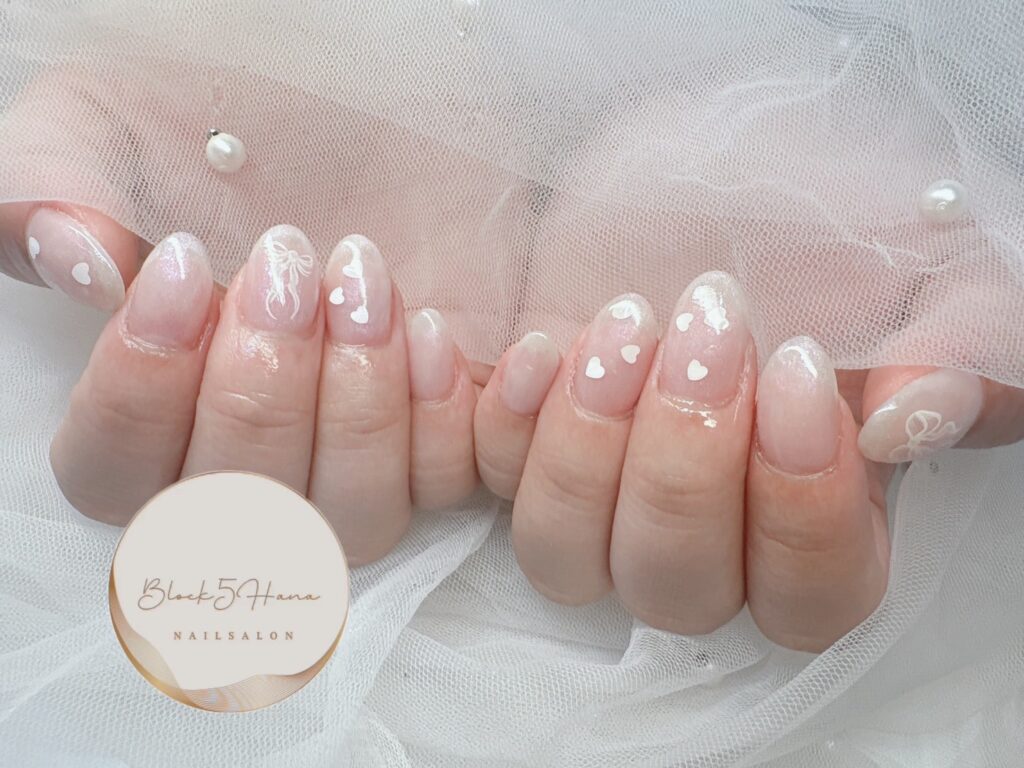 Nail No.3331【ホワイトパールのリボンデザイン】