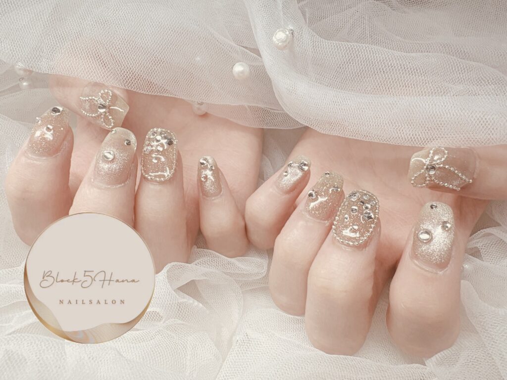 Nail No.3812【リボンやストーンでキラキラマグネットネイル】